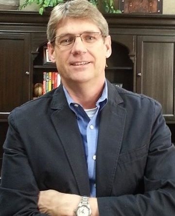 Portrait of Kevin Herbert.